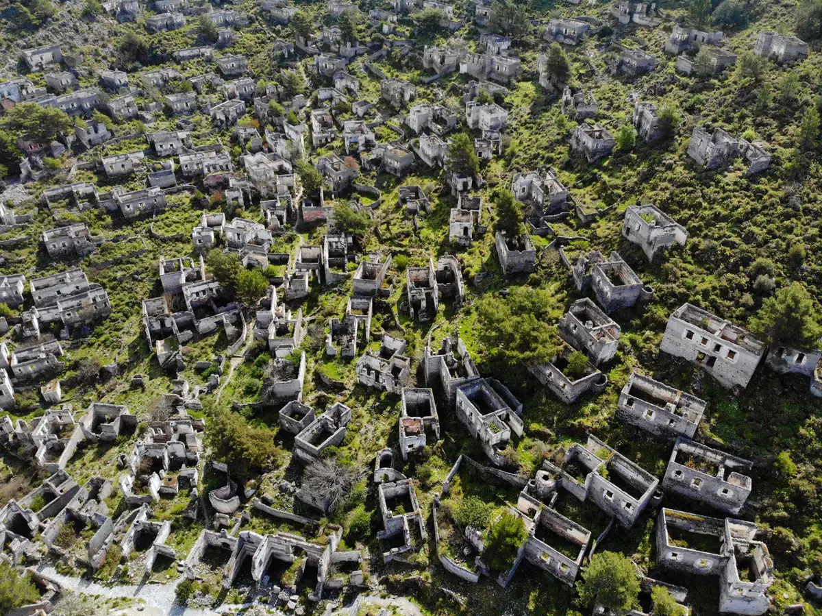 Roofless stone houses on the hillside at Kayaköy